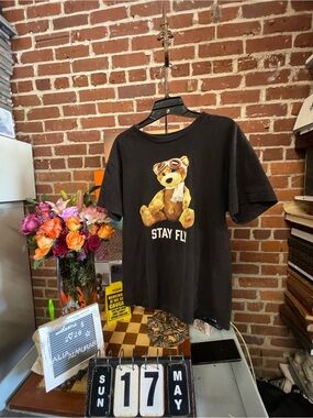 Fashion Nova Stay Fly Teddy short sleeve tee.